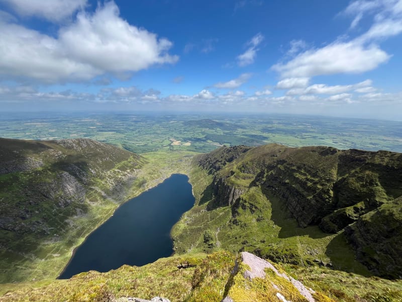 Aerial view of Coumshingaun Lake nestled in a glacial corrie in the Comeragh Mountains, Co Waterford, Ireland.