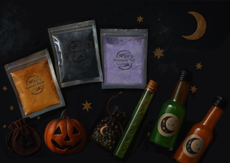 Samhain Potion Kit flatlay with coloured powder pouches, potion bottles, and a mini jack-o-lantern on a dark star-scattered background.
